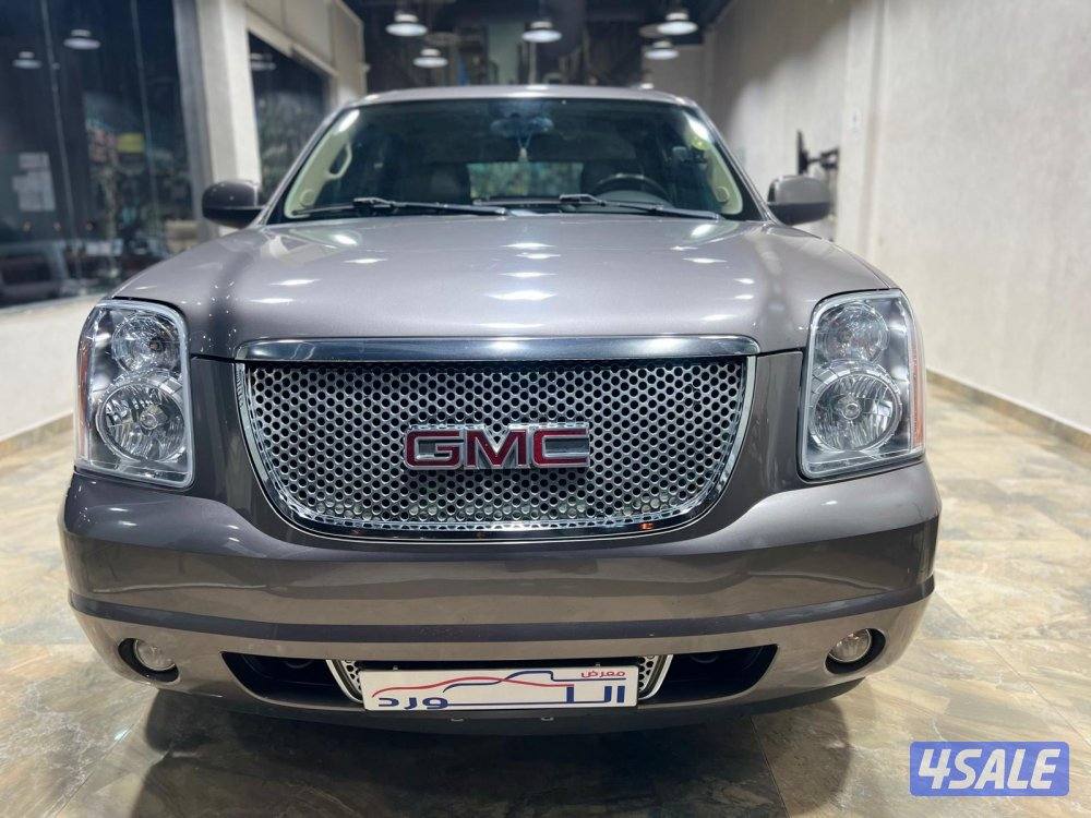 يوكن دينالي موديل 2014 ماشي 200 الف بحالة نادرة جداً5