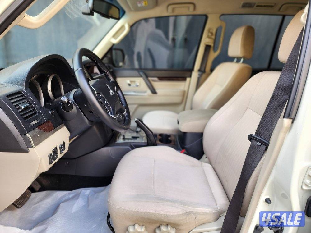 باجيرو موديل ٢٠٢٢ ماكينة صغيرة عداد 157 ألف أبيض صدفي شرط الفحص4