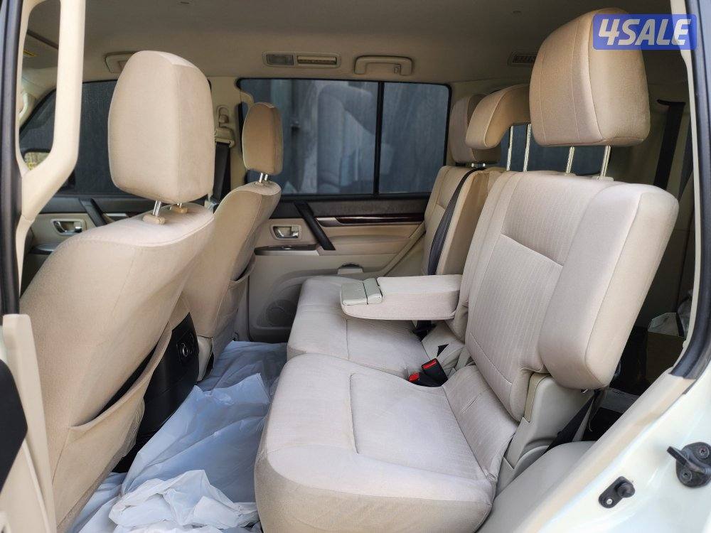 باجيرو موديل ٢٠٢٢ ماكينة صغيرة عداد 157 ألف أبيض صدفي شرط الفحص5