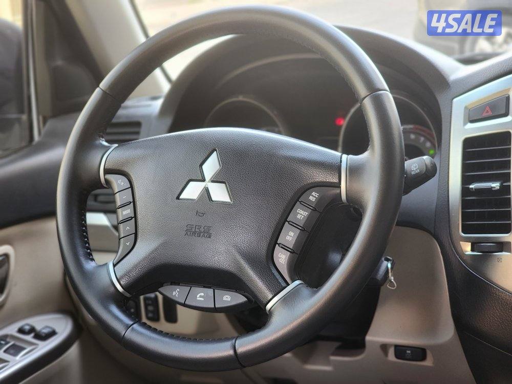 باجيرو موديل ٢٠٢٢ ماكينة صغيرة عداد 157 ألف أبيض صدفي شرط الفحص7