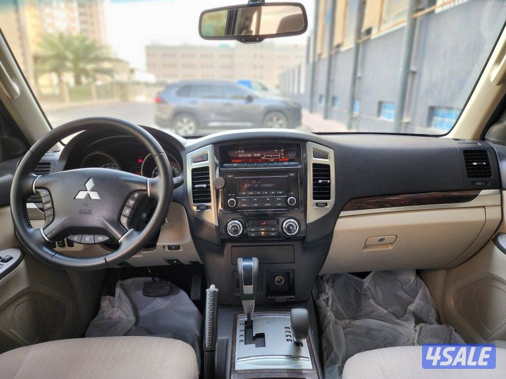 باجيرو موديل ٢٠٢٢ ماكينة صغيرة عداد 157 ألف أبيض صدفي شرط الفحص6