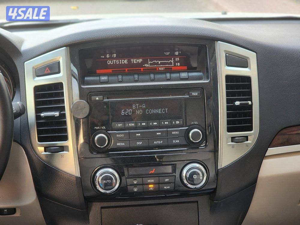 باجيرو موديل ٢٠٢٢ ماكينة صغيرة عداد 157 ألف أبيض صدفي شرط الفحص8