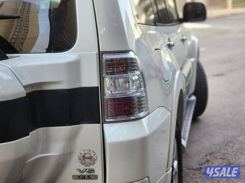 باجيرو موديل ٢٠٢٢ ماكينة صغيرة عداد 157 ألف أبيض صدفي شرط الفحص14