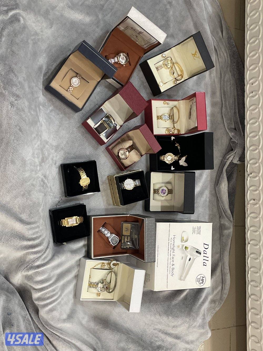 13 مجموعه من الساعات و الاطقم جديده و جهاز ليزر منزلي  جديد0