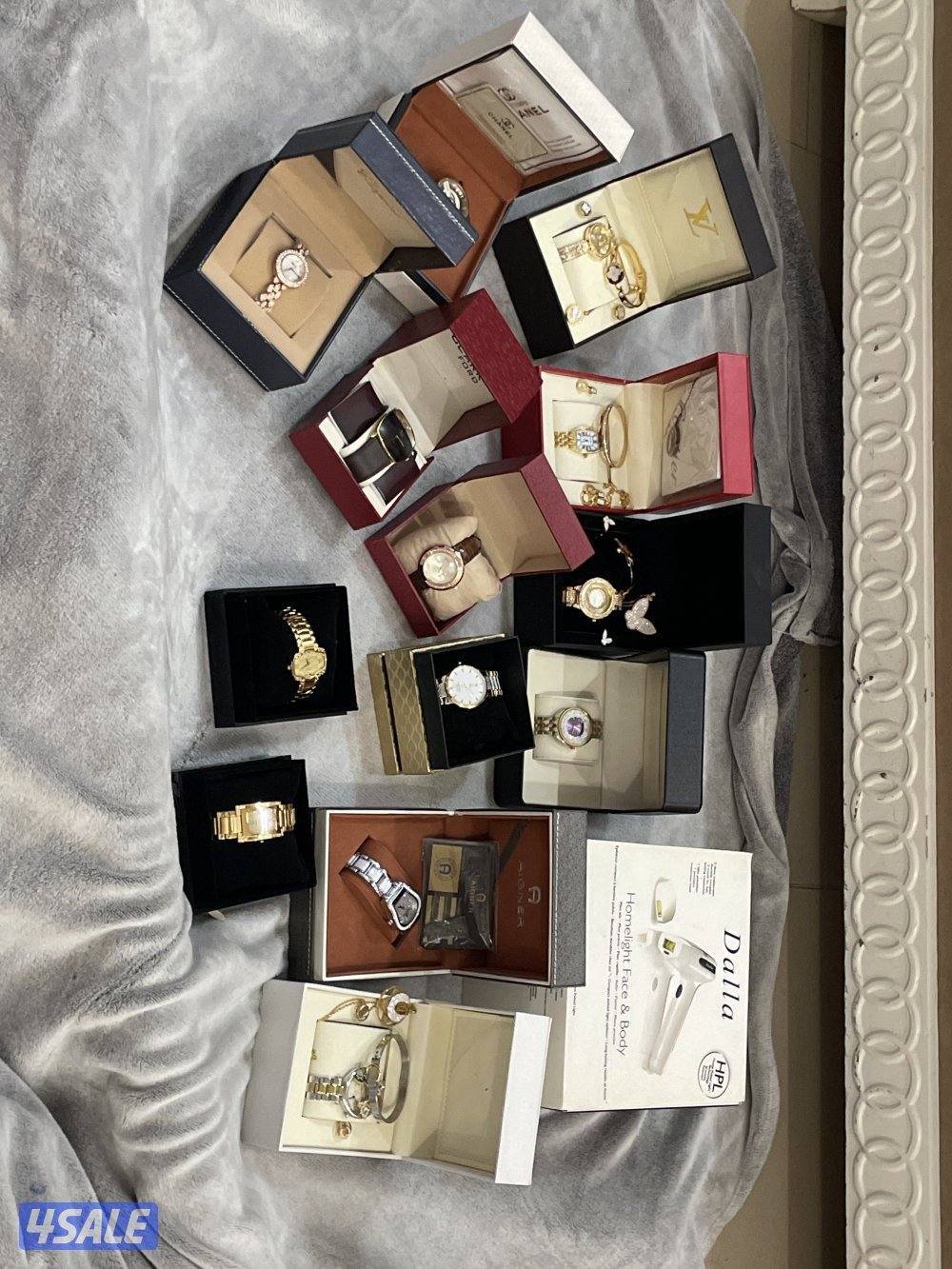 13 مجموعه من الساعات و الاطقم جديده و جهاز ليزر منزلي  جديد1