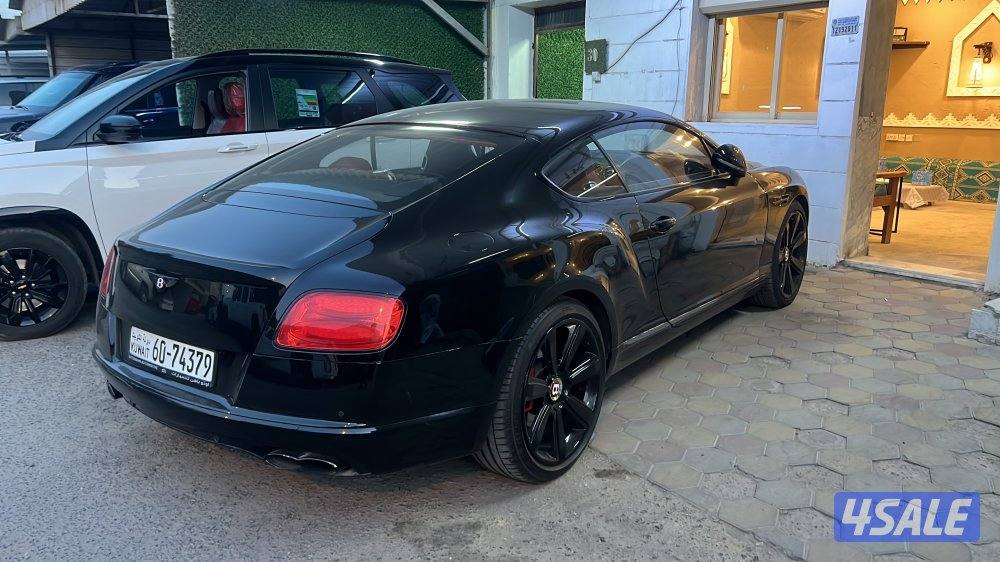 بنتلي 2016 عليها ستيكر من كيوبوند 1000دينار اسود واللون الاصلي رمادي1