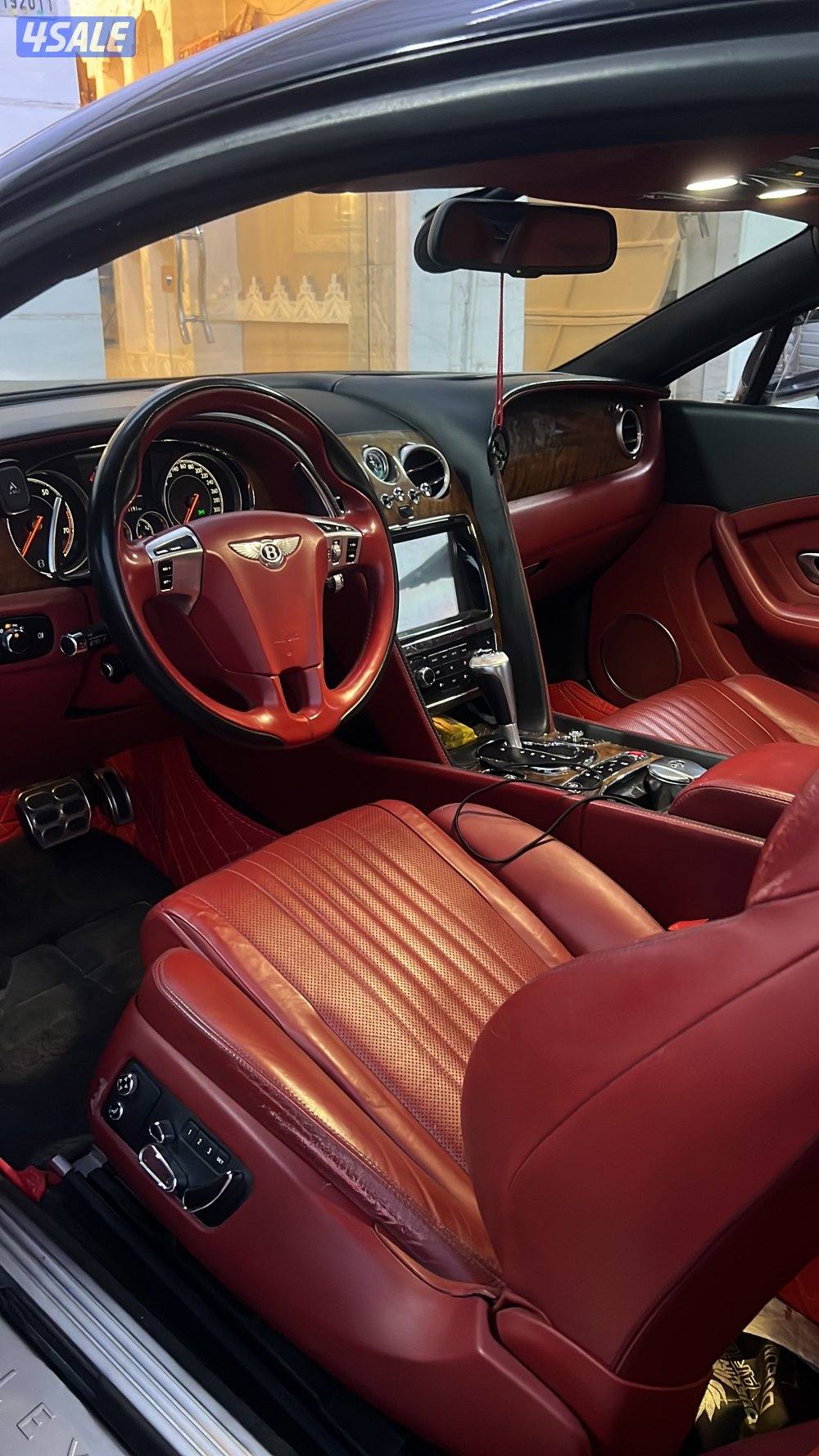 بنتلي 2016 عليها ستيكر من كيوبوند 1000دينار اسود واللون الاصلي رمادي2