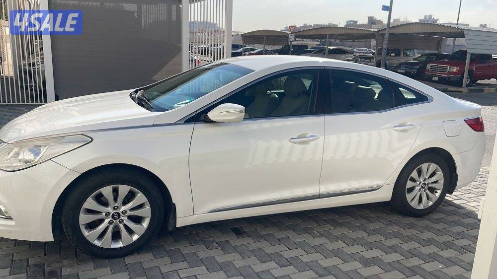 للبيع هيونداي أزيرا ٢٠١٤ اللون أبيض فيه أصباغ متفرقة4