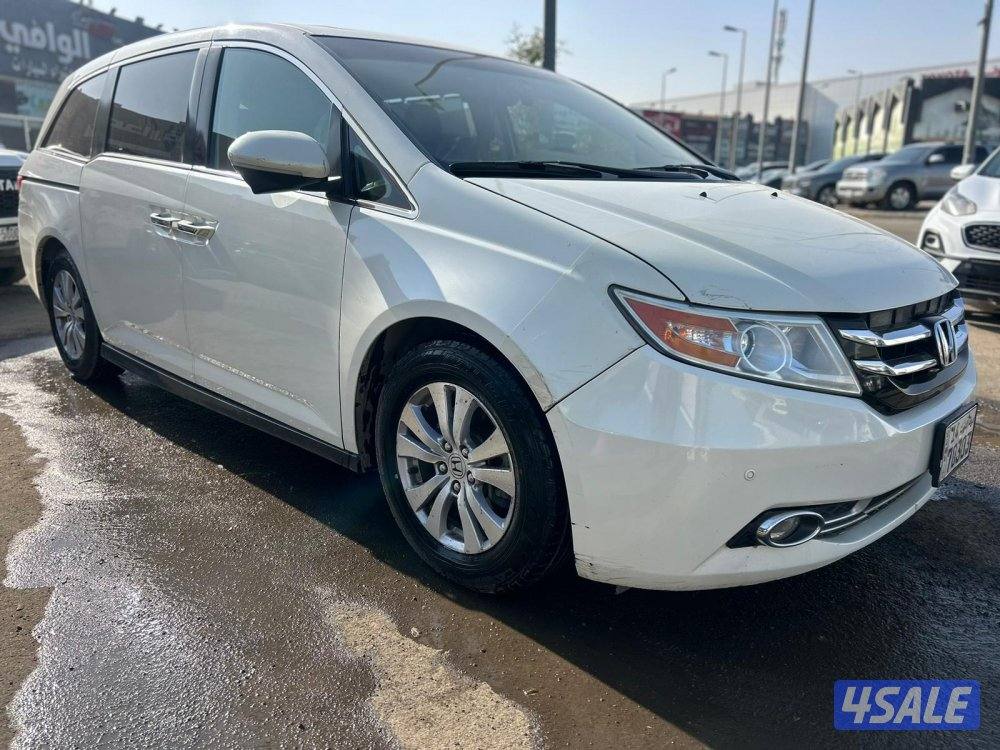 هوندا اوديسي موديل 2016 ماشي 209.000 k.m وارد الغانم.1