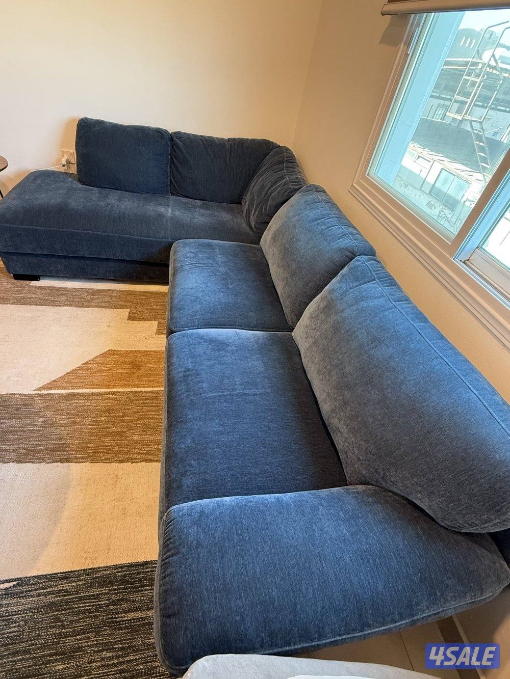 4 seats blue couch and large carpet. Excellent condition0