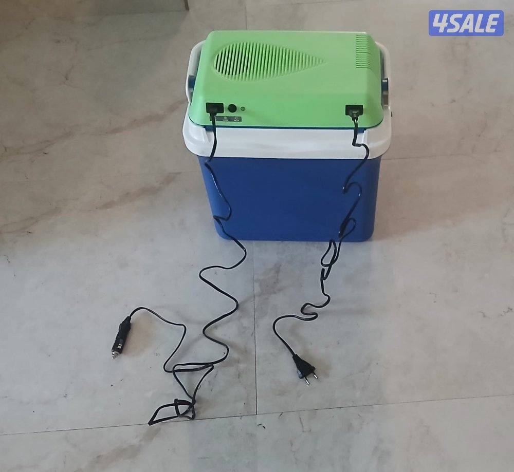 ثلاجه رحلات توصل بالسياره او البيت كهربا كالجديدة لم تستعمل الا مره3