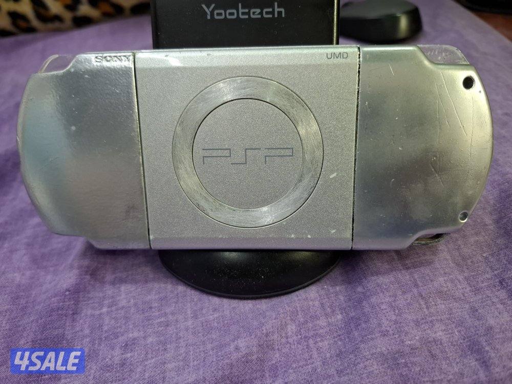 PSP SLIM P2000 MODEL..GREY COLOR 8GB SD CARD WITH 45 GAMES2