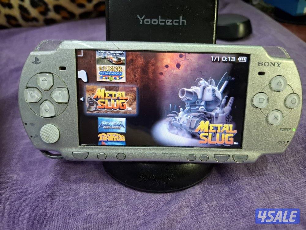PSP SLIM P2000 MODEL..GREY COLOR 8GB SD CARD WITH 45 GAMES6