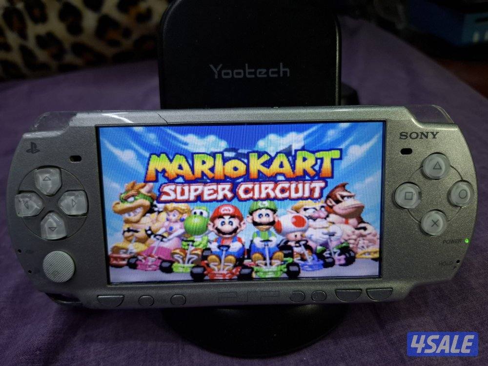 PSP SLIM P2000 MODEL..GREY COLOR 8GB SD CARD WITH 45 GAMES9