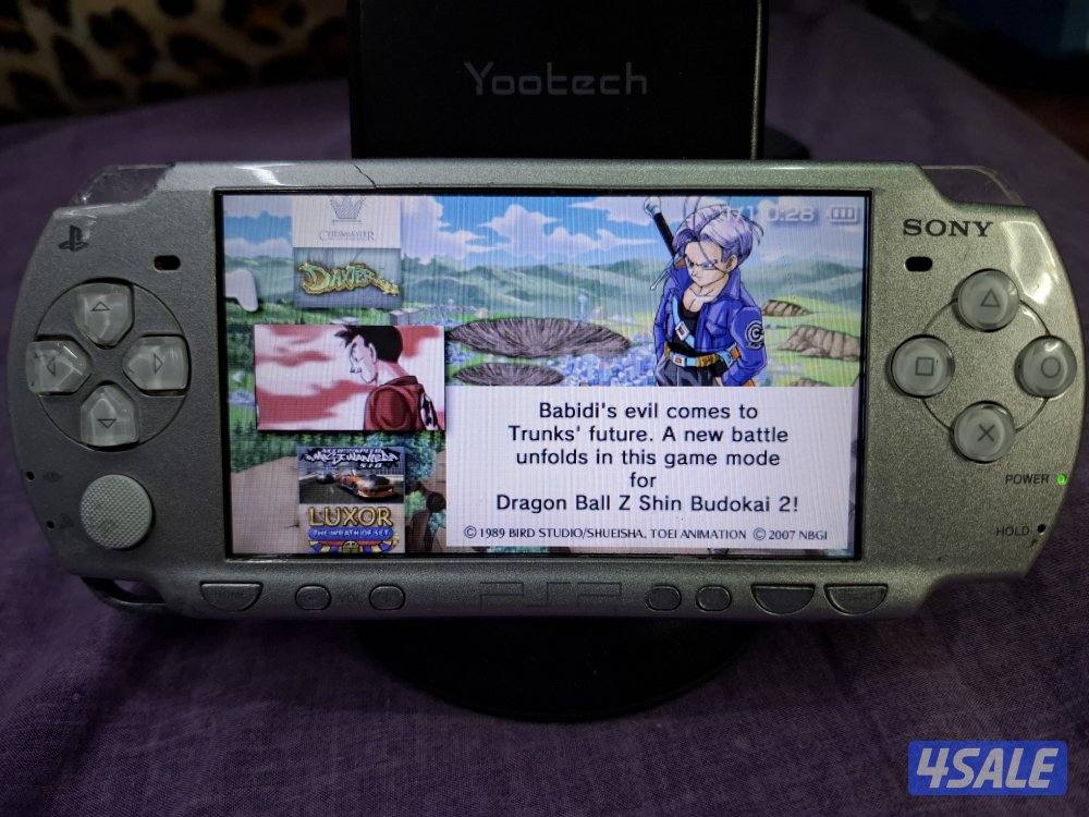 PSP SLIM P2000 MODEL..GREY COLOR 8GB SD CARD WITH 45 GAMES10