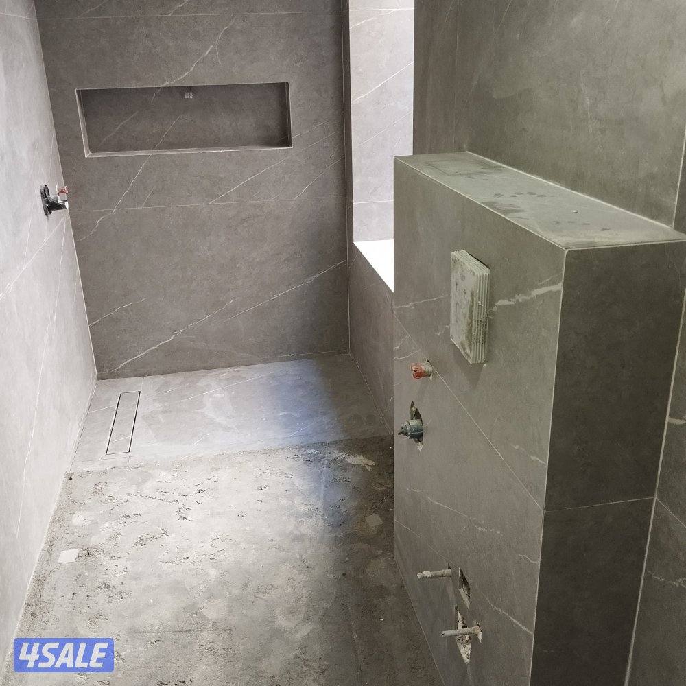 معلم باكستاني  جرنيت بورسلان  رخام حمام مطبخ فوق الكاشي تكسيرتركيب0