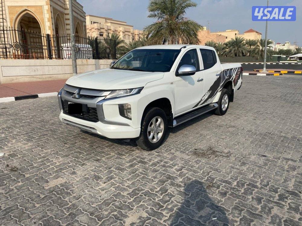 2022 (بنزين)MITSUBISHI دبل قير1