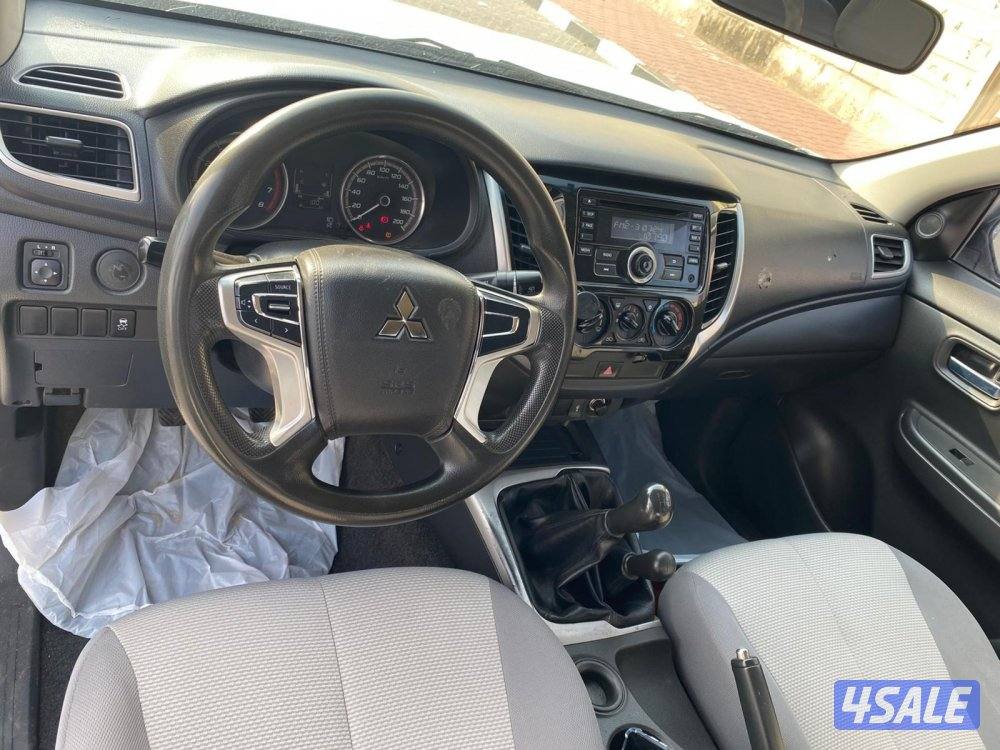 2022 (بنزين)MITSUBISHI دبل قير4