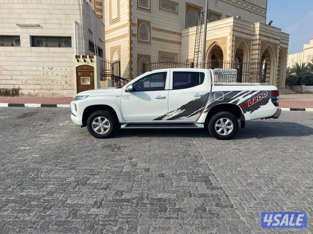 2022 (بنزين)MITSUBISHI دبل قير7