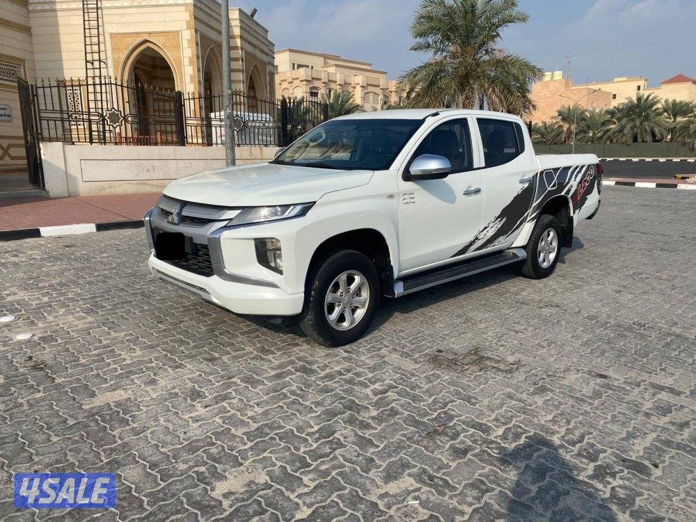 2022 (بنزين)MITSUBISHI دبل قير12