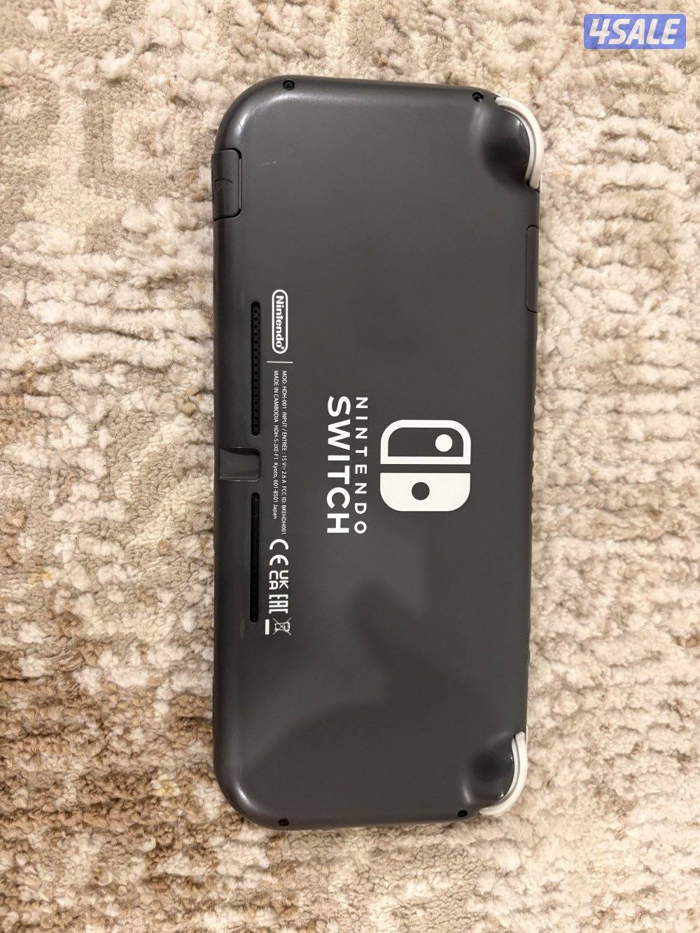 سوتش لايت مستعمل بحالة جيدة مع ذاكرة ١٢٨ جيجا مع شحط بسيط قابل للتفاوض1