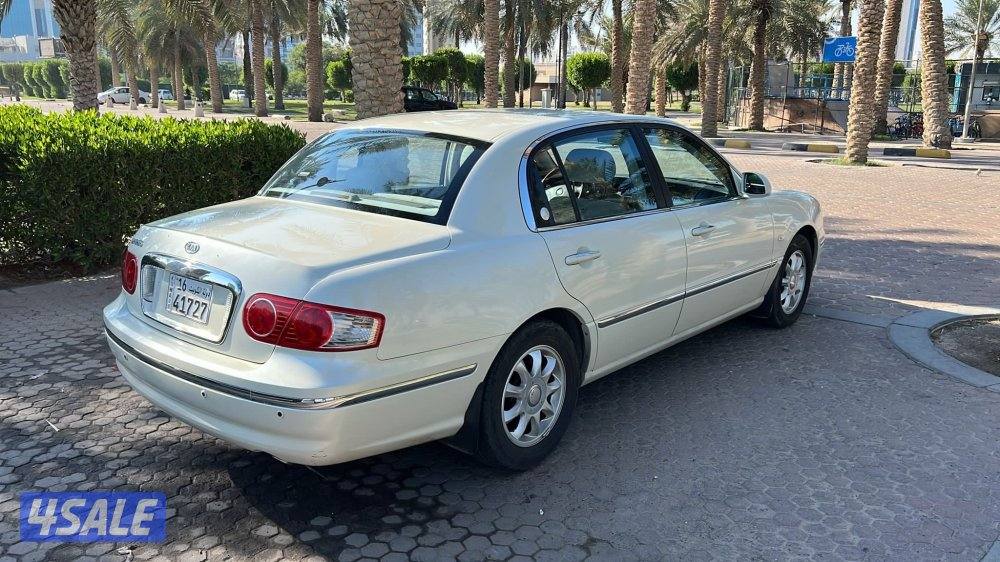 للبيع كيا اوبيروس موديل 2005 ماشي 72 صبغ وكالة4