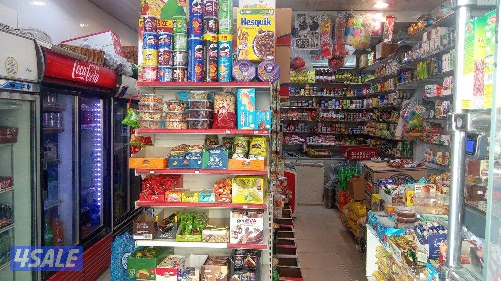 بقاله للبيع شامل البضاعه و الثلاجات0