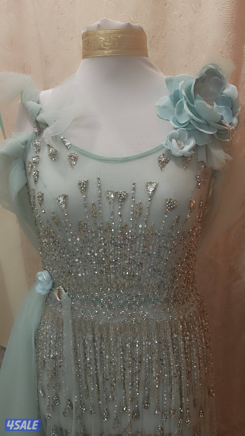 فستان عرس راقي مصنوع من التور ومشكوك بالأحجار والترتر8