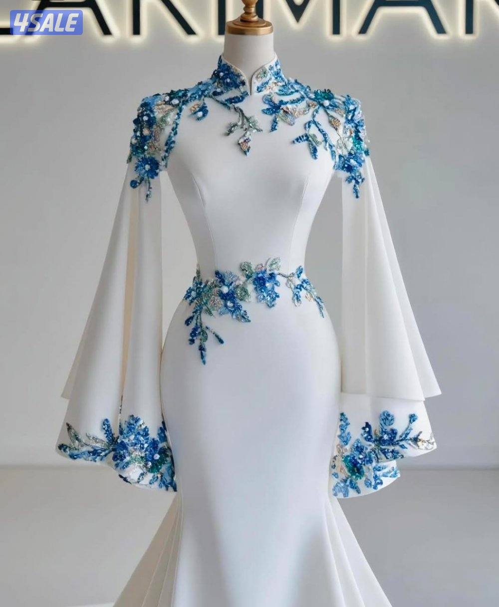 خياط وقصاص للملابس النسائية0