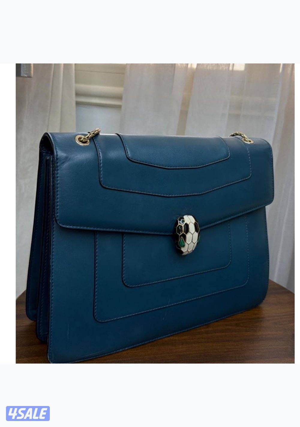 جنطة بولغاري اصلية مع الكيس والداست باق بدون فاتوره التواصل واتس0