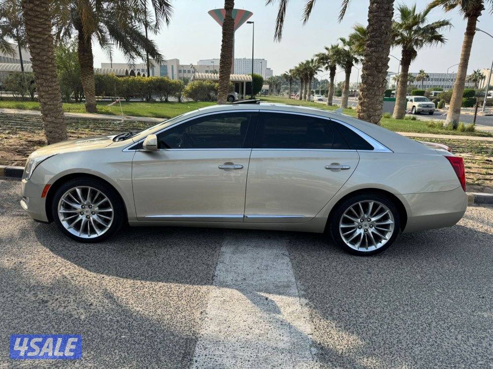 كاديلاك XTS4 ماشي 40 سيرفس حديث مديل 2013 نظيف جدا شرط الفحص5