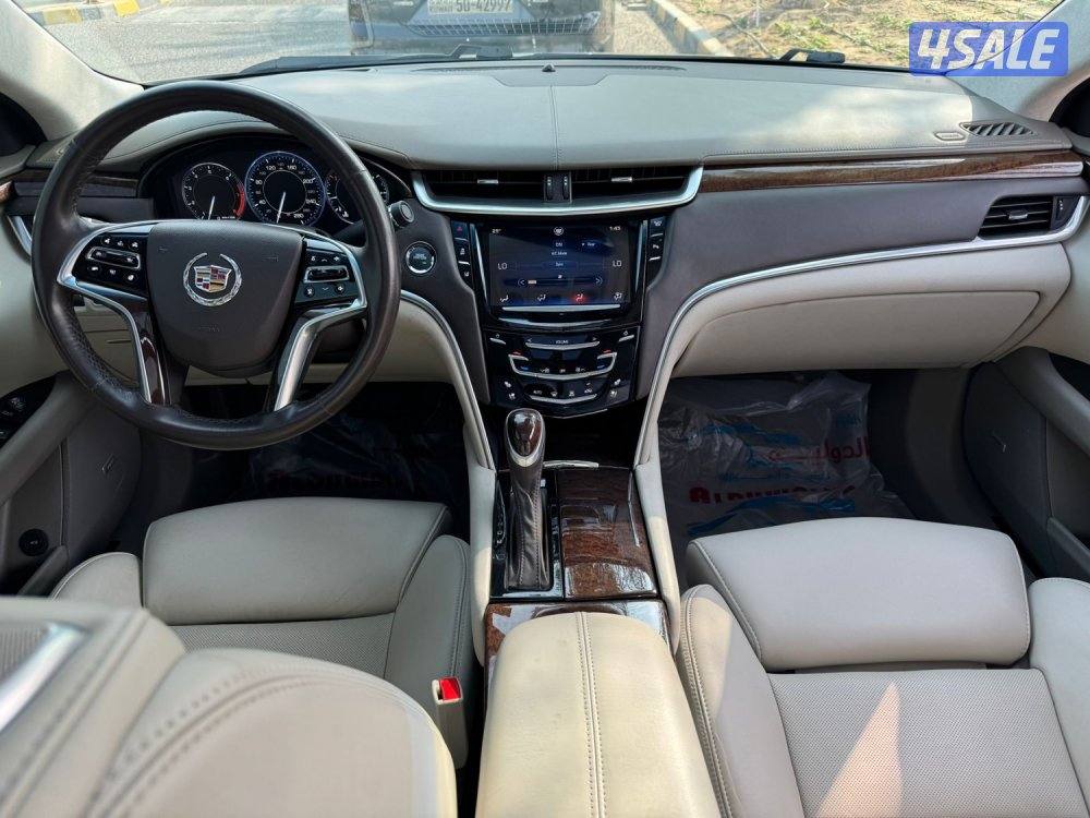 كاديلاك XTS4 ماشي 40 سيرفس حديث مديل 2013 نظيف جدا شرط الفحص7