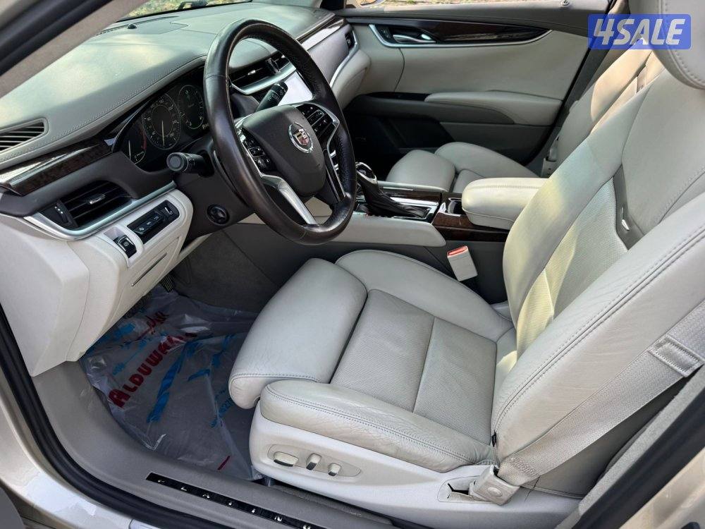 كاديلاك XTS4 ماشي 40 سيرفس حديث مديل 2013 نظيف جدا شرط الفحص9