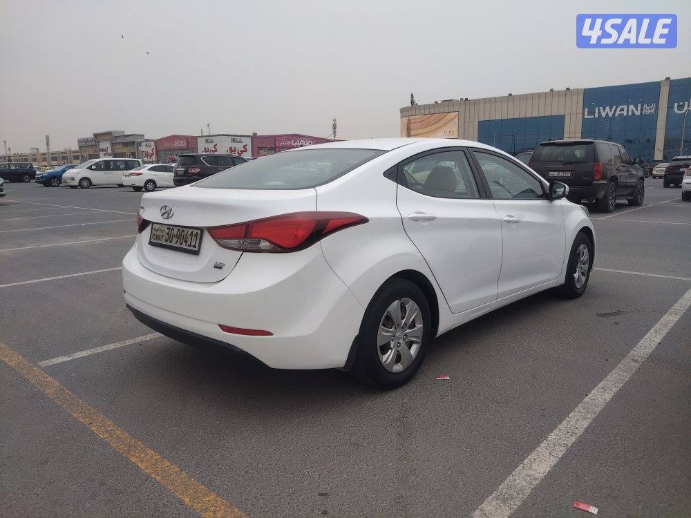 هيونداي النترا 2015 لون أبيض عداد 206 بحاله ممتازة2