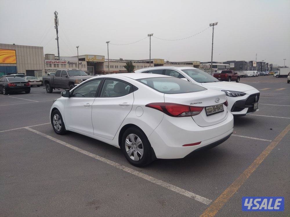 هيونداي النترا 2015 لون أبيض عداد 206 بحاله ممتازة3