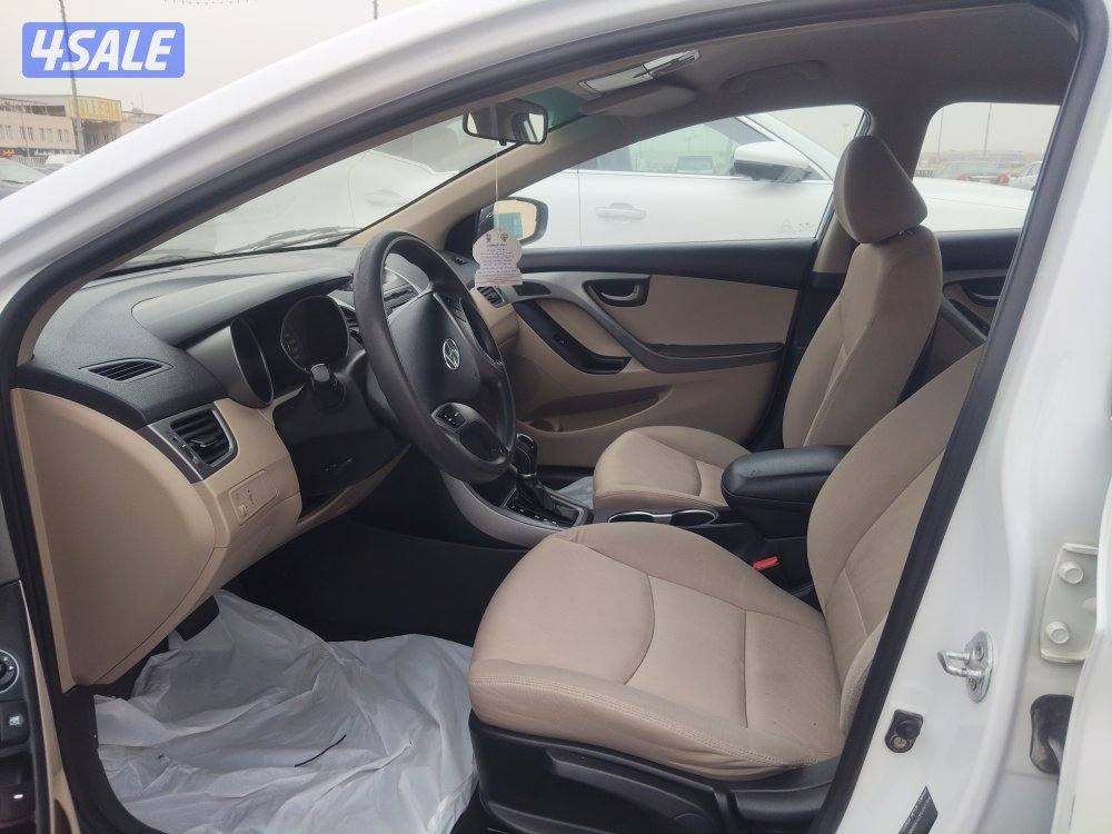 هيونداي النترا 2015 لون أبيض عداد 206 بحاله ممتازة4