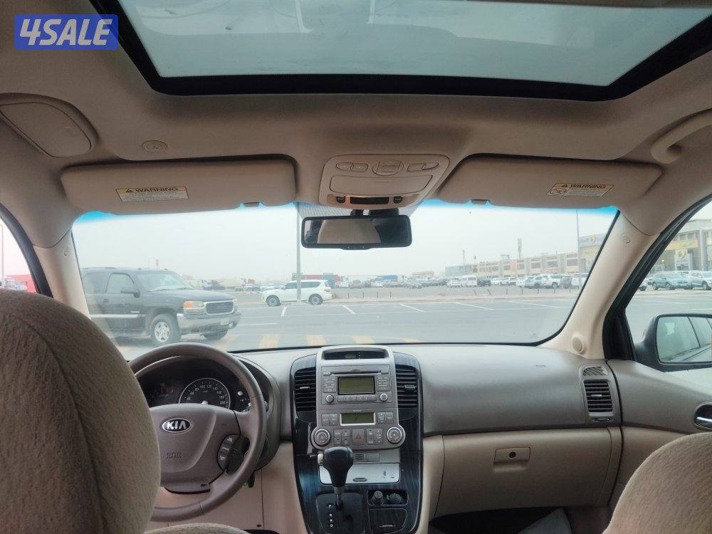 كيا كرنفال موديل 2013 رمادي عداد ٢٣٩ الف فل كامل بحاله ممتازة7