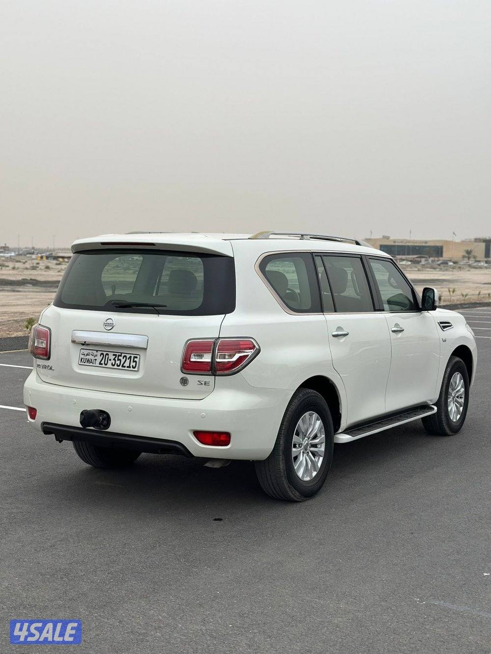نيسان باترول SE موديل 2014 ابيض عداد ١٩٩ الف بحاله ممتازة2