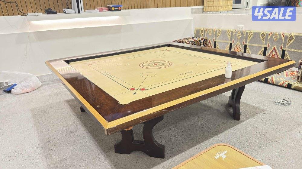 طاولة كيرم0