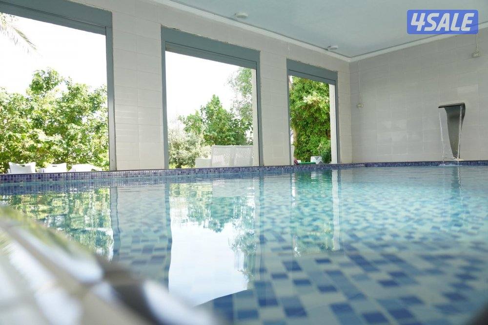 للبدل شاليه بالمرحله الثالثه بصباح الاحمد البحريه بيت سكني او ارض1