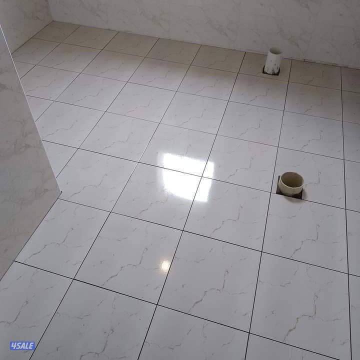 فني سيراميك وبورسلان وباركيه سيراميك تكسير وتركيب جميع مناطق الكويت اق5