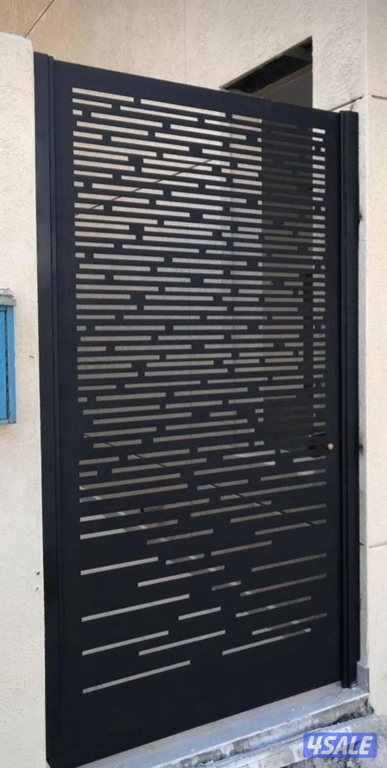 حداد ايراني حديد  مشغول ابواب درابزين اسوار تركيب مضلات خشبي2