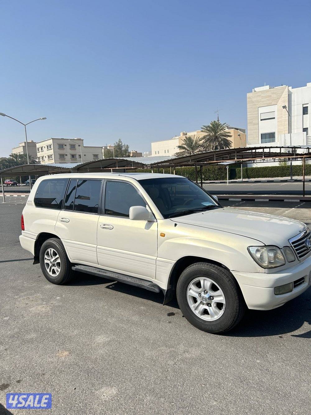 جيب لكزس lx470 ابيض شرط شاصي جيد الموتر شغال تواير جديده2