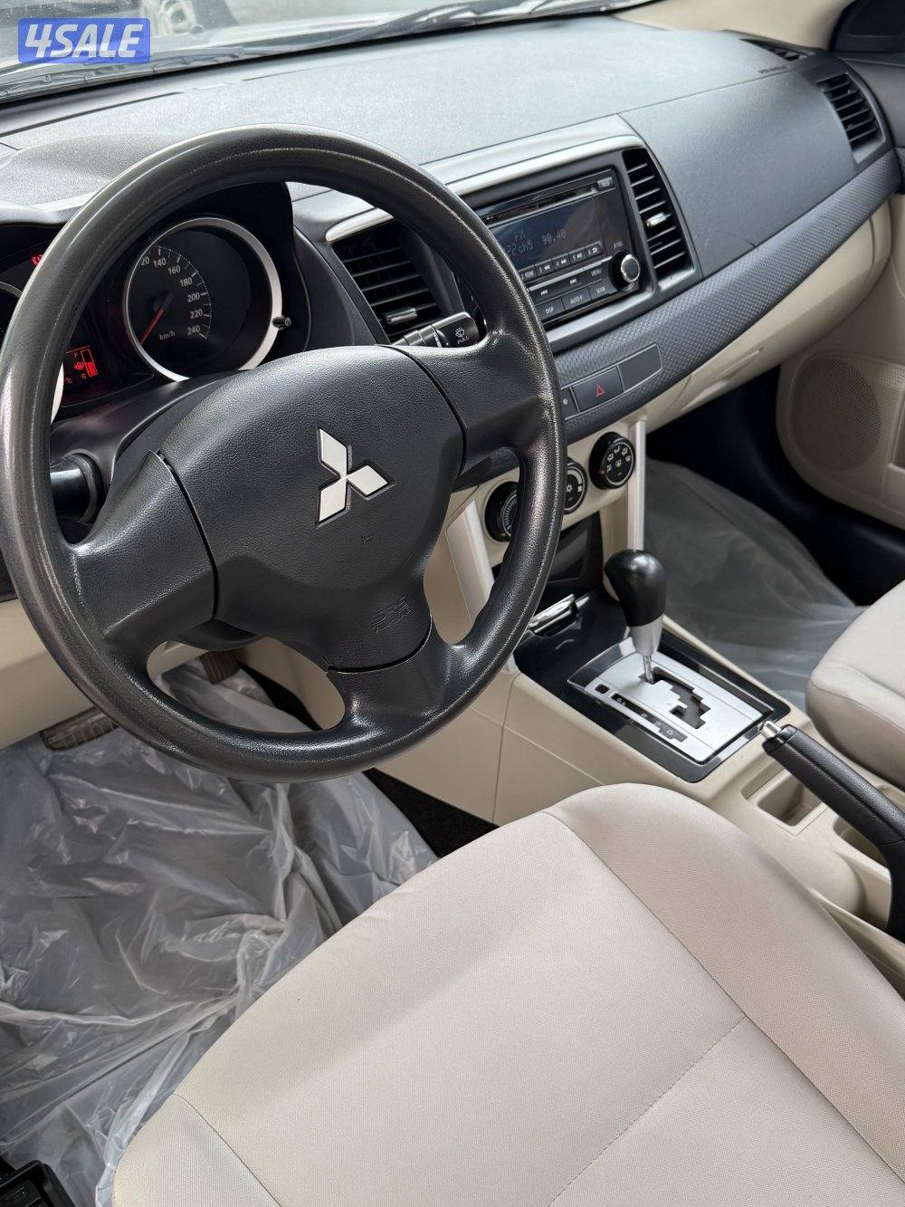 لانسر Ex موديل 2016 ماشية ١٨٩ الف كيلو شرط الفحص3