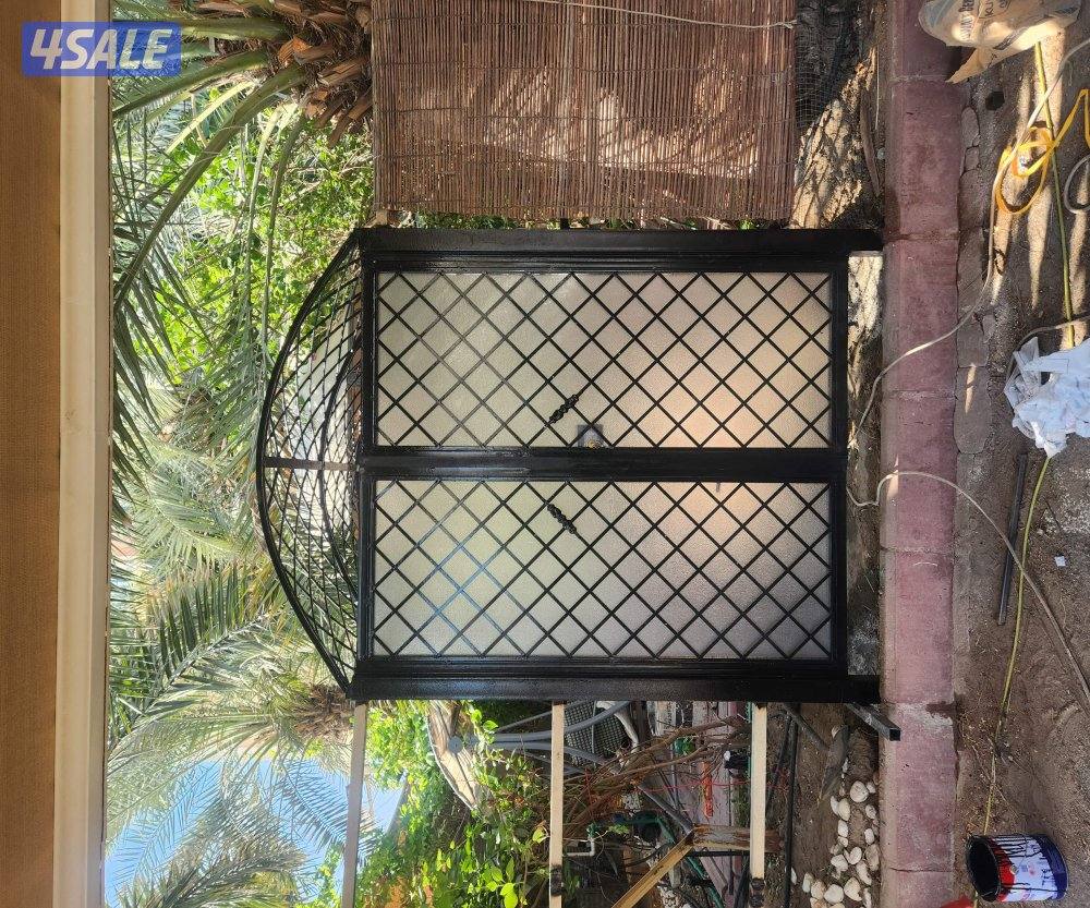 حداد ایراني  حدید مشغول ابواب درابزین اسوار ترکیب مضلات خشبي شبك تركي5