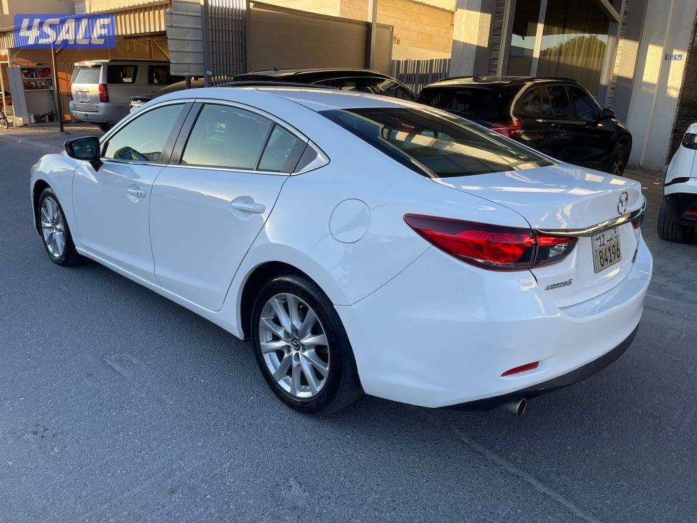 صبغ الوكالة مازدا 63