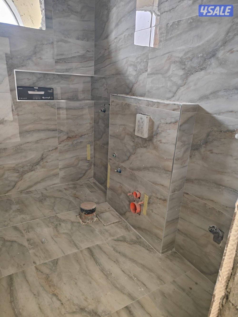 فني صحي تكسير وتمديد وتشطيب الحمامات والمطابخ1