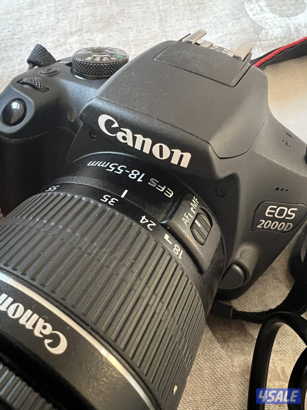 كاميرا كانون EOS 2000D الرقمية بعدسة عاكسة DSLR+ عدسة 55-18 ملم0