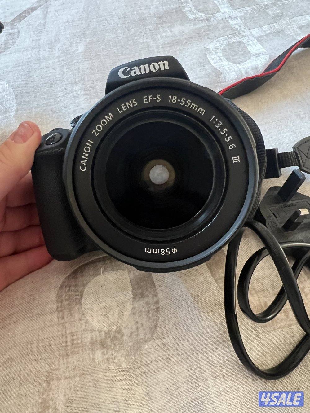 كاميرا كانون EOS 2000D الرقمية بعدسة عاكسة DSLR+ عدسة 55-18 ملم1