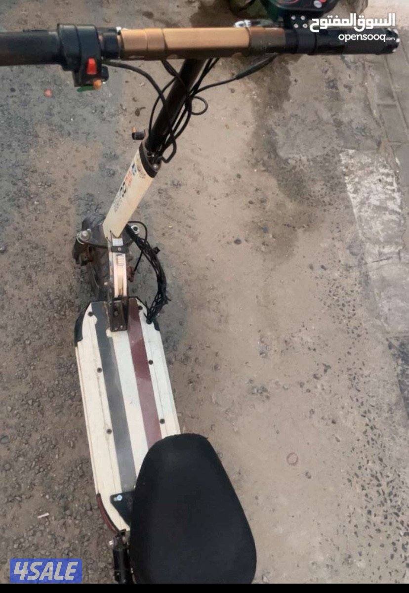 سكوتر كهربائي مايجي الا الصامل التاير يبيلك تغيره الي ورا خربان0